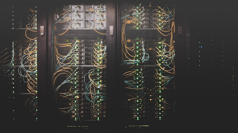 Network server rack and cables — Mac and Apple support service in Paris
